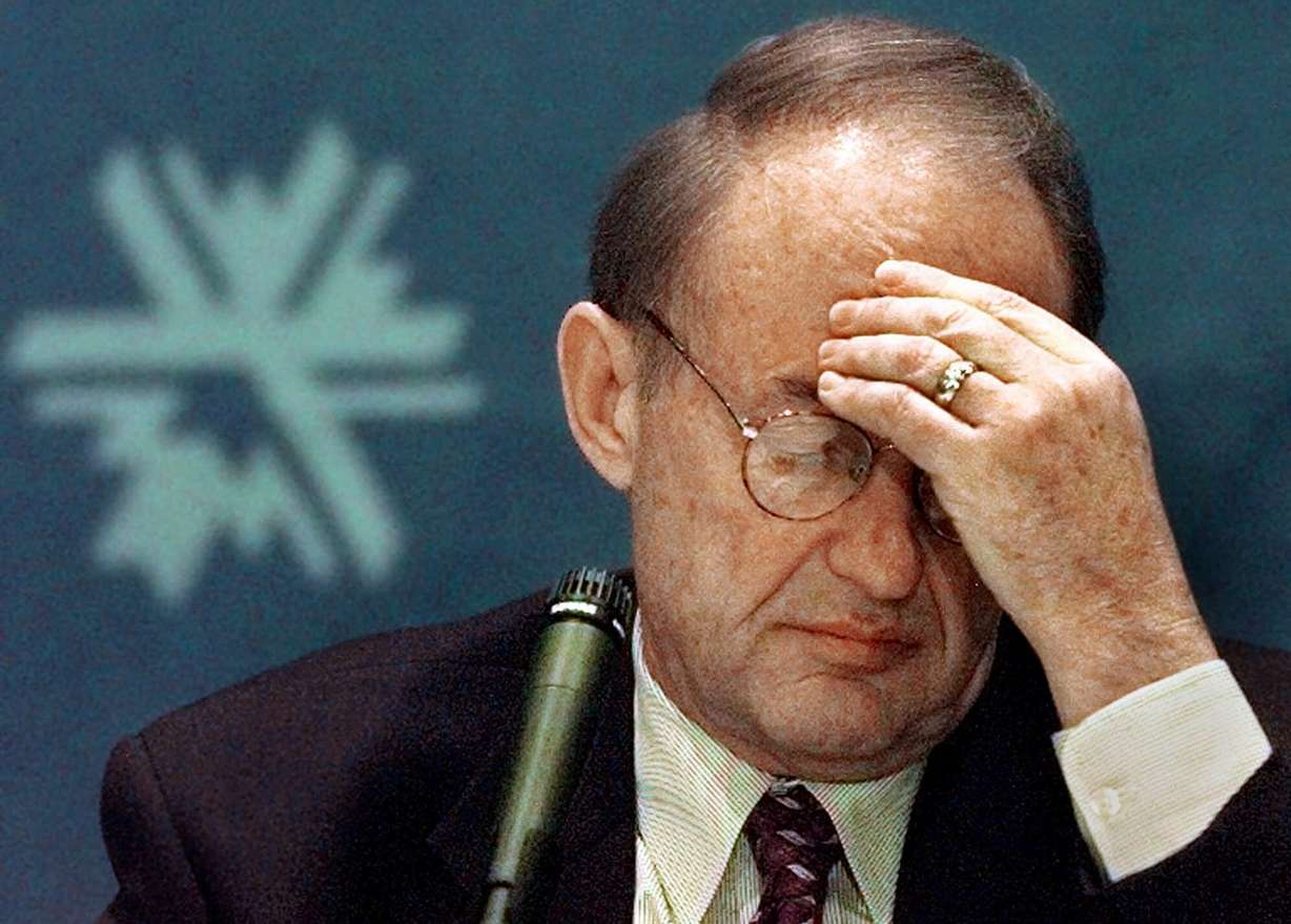 Salt Lake Organizing Committee Chairman Robert Garff holds his head during a SLOC board meeting held in Salt Lake City, Tuesday Feb. 9, 1999, to release the board of ethics report on the committee's actions in winning the 2002 Winter Olympic bid. (Photo: Beth A. Keiser, AP Photo, File)