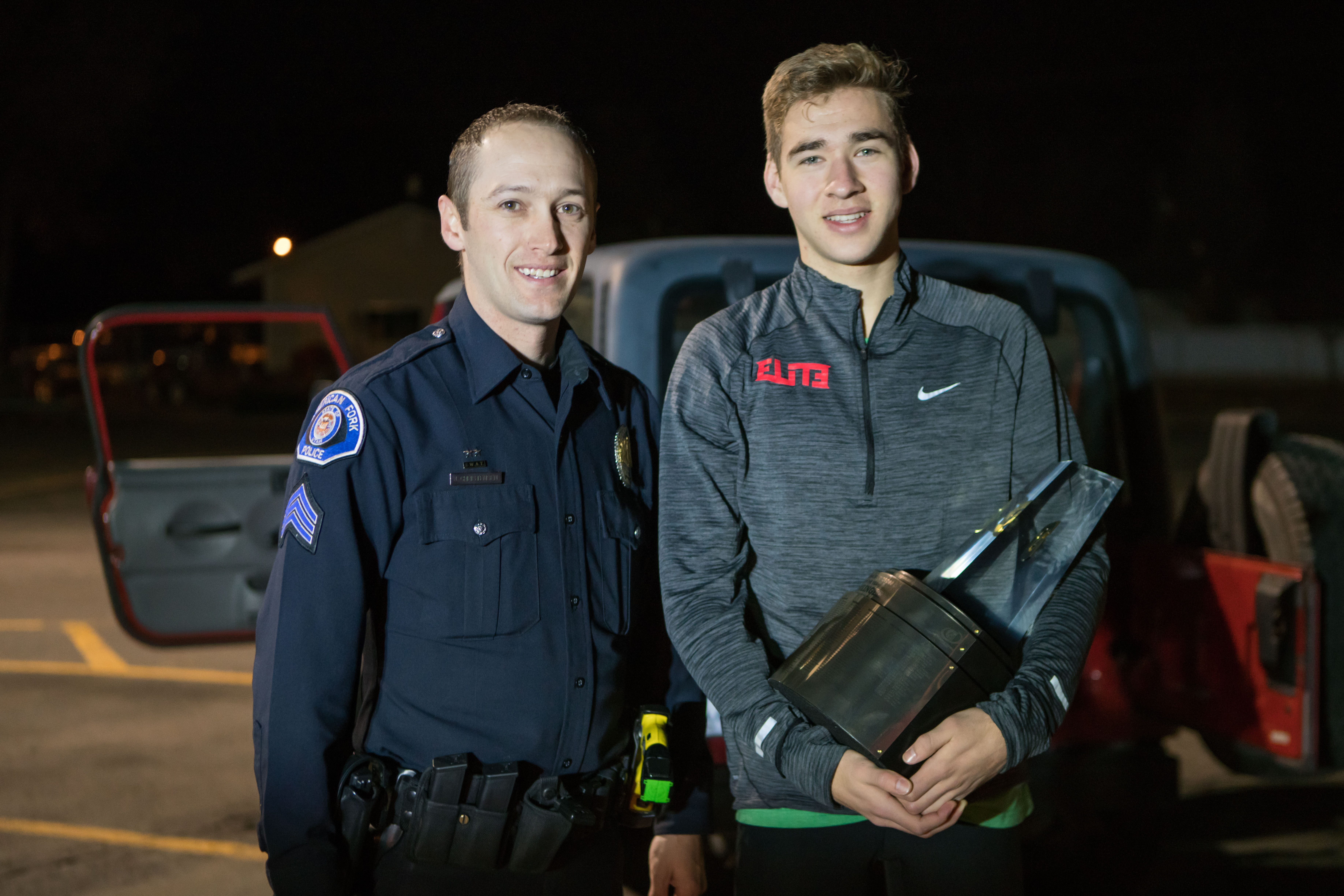 A local police officer surprises American Fork senior Casey Clinger with the 2016-17 Gatorade National Boys Cross Country Runner of the Year Award Thursday, February 9, 2017. (Photo: Gatorade)