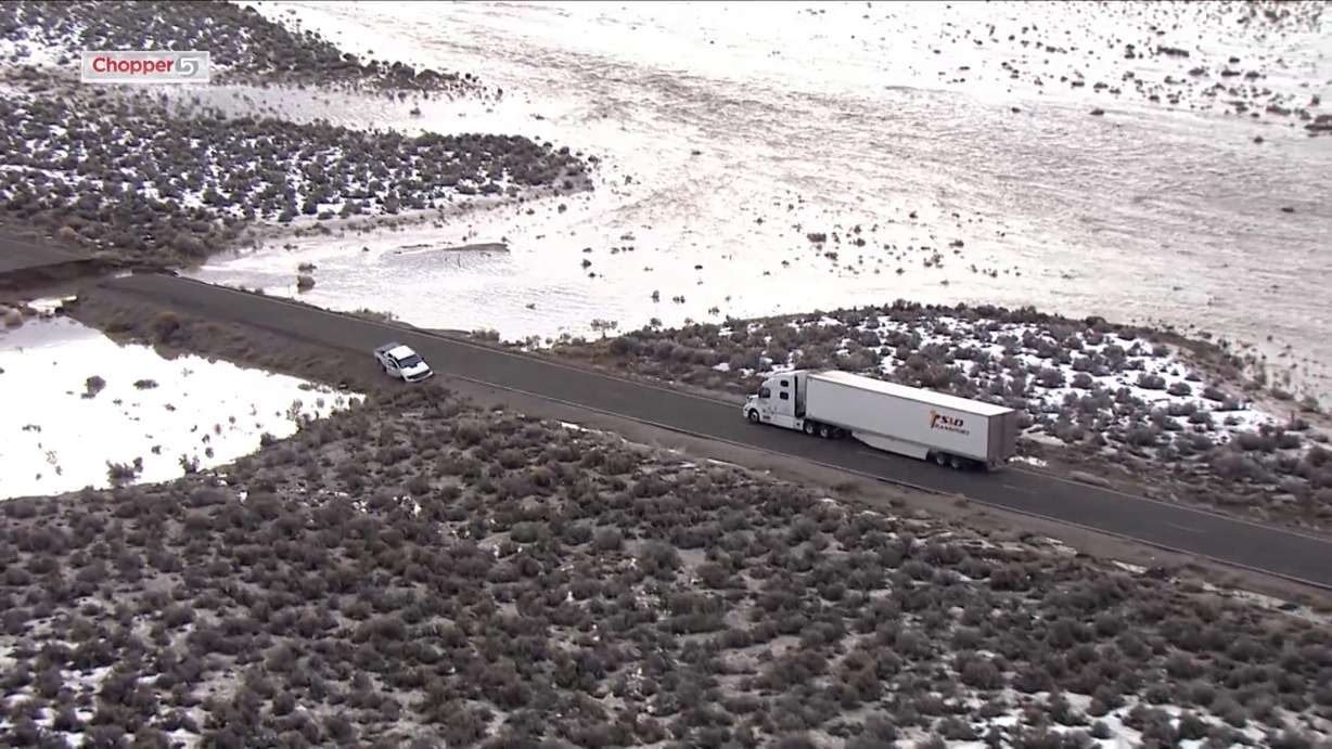 Flooding from a breached earthen dam continues to plague an Elko County town and has washed out a stretch of highway just past the Utah border. (Chopper 5, KSL TV)