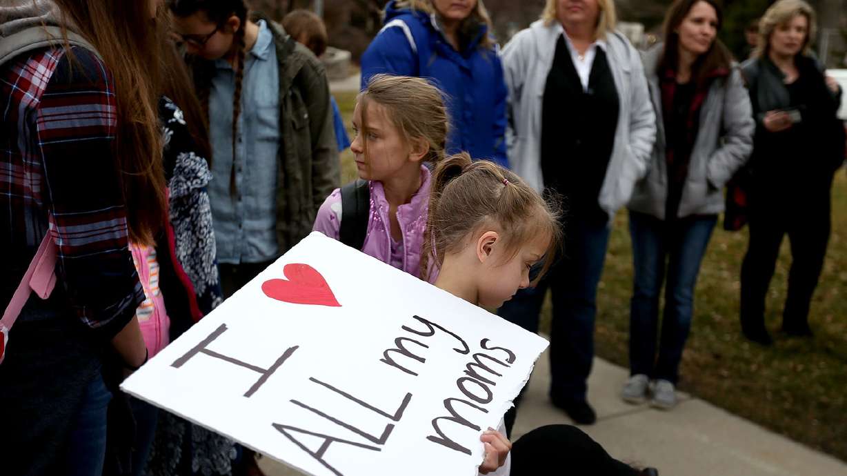 'We're not going away': Polygamous groups march to Capitol to protest bill