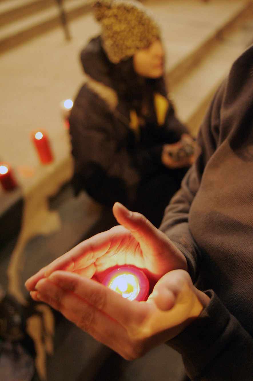 A small candlelight vigil was held by a group of friends who gathered across the street from Trolley Square where fatal shootings took place Monday night. February 13, 2007. (Photo: Mike Terry, Deseret News, File)