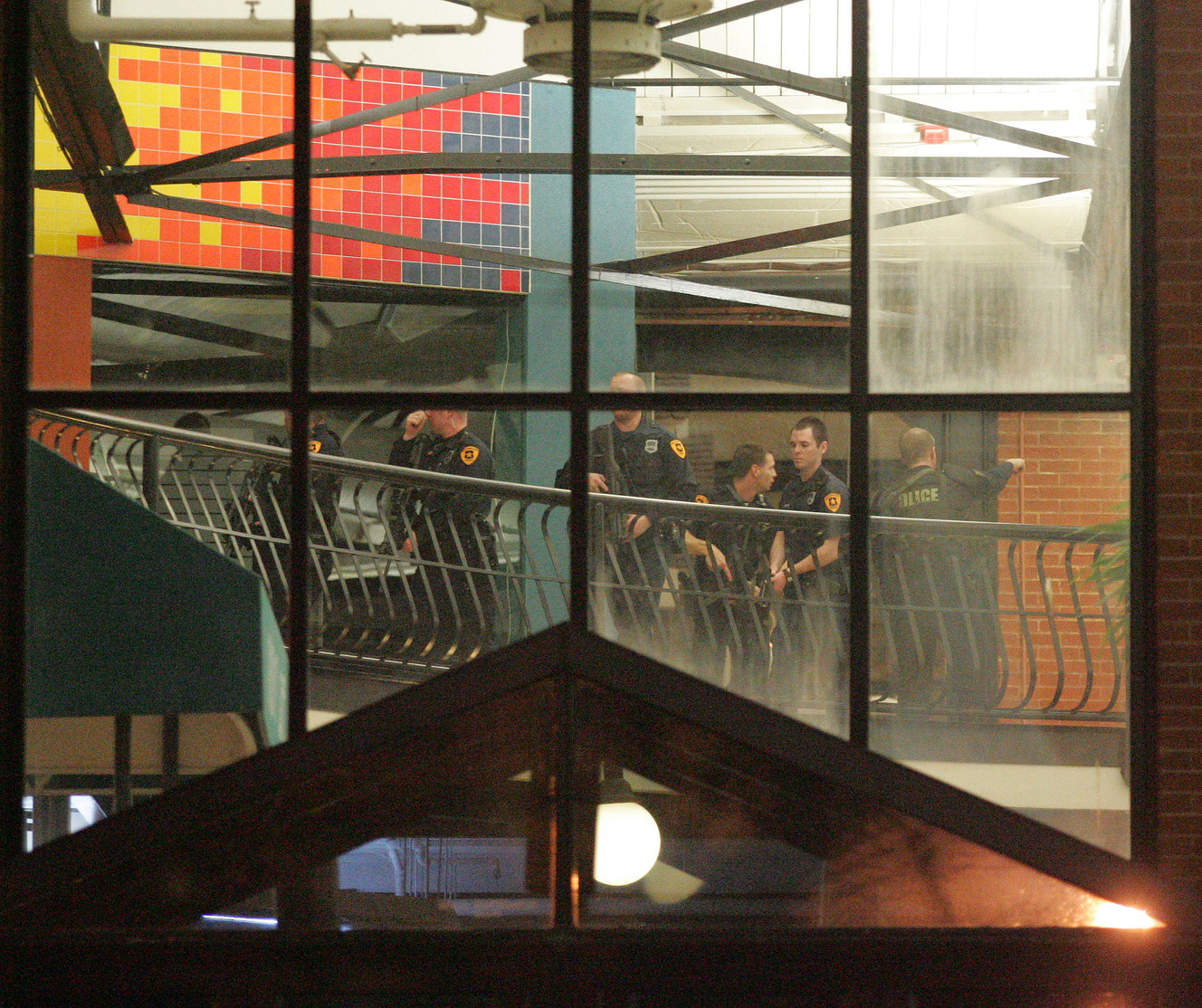Police gather around the inside of Trolley Square after a gunman went on a shooting rampage inside the mall on Monday, Feb 12, 2007 (Photo: Mike Terry, Deseret News, File)