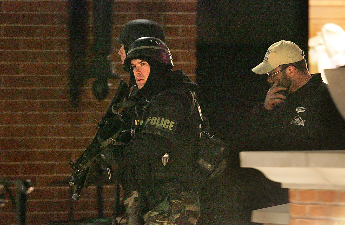 SWAT officers move through the mall after a gunman opened fire in the Trolley Square shopping mall in Salt Lake City, Utah, Feb. 12, 2007. (Photo: Mike Terry, Deseret News, File)