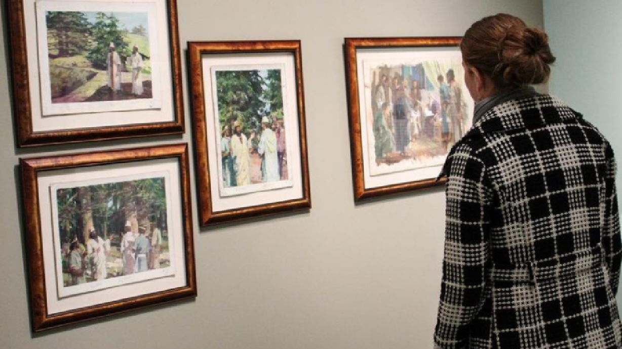 Who is the Seventh-day Adventist whose paintings are all over Mormon churches?