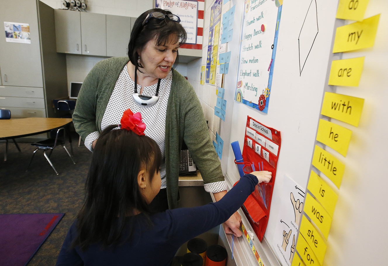 Julie Folsom, a teacher at Granger Elementary School, works with student Tuyen Doam in West Valley City on Wednesday, Feb. 15, 2017. The House Education Committee, on a 6-4 vote Tuesday, agreed to send HB212 to the House. The bill would extend bonuses to teachers who teach in high poverty schools and their students demonstrate academic growth over a three-year period. (Photo: Jeffrey D. Allred, Deseret News)