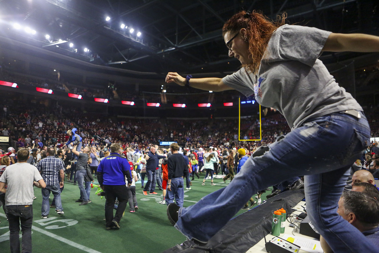 Screaming Eagle fans storm the field after the first touchdown of the first game of the season at the Maverick Center in Salt Lake City on Thursday, Feb. 16, 2017. (Photo: Nicole Boliaux, Deseret News)