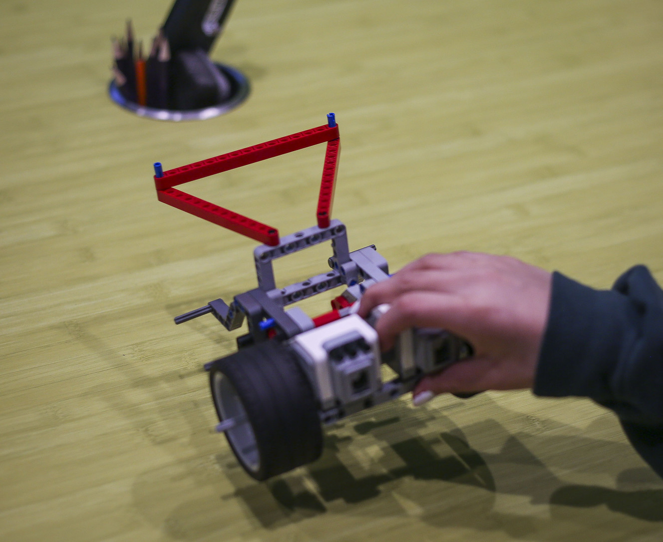 Paloma Velazquez plays with a robot made of Lego blocks during Lego Camp at Zaniac Learning in Salt Lake City on Monday, Feb. 20, 2017. (Photo: Nicole Boliaux, Deseret News)