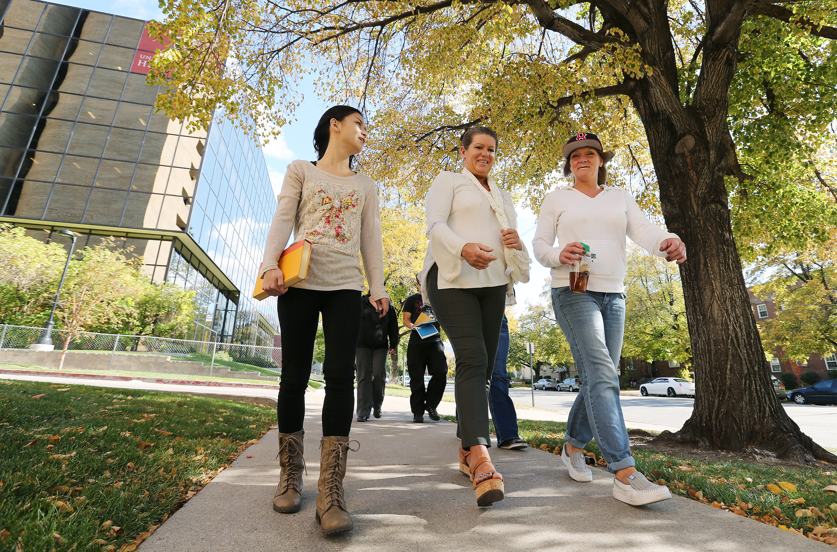 Odyssey House clients Barbara Pierce, center, and Kilee Hori and Tracey DeHaas walk to work out in Salt Lake City on Tuesday, Oct. 25, 2016. Pierce was one of 132 individuals arrested in Operation Diversion and was homeless and addicted to heroin at the time, but she has been clean for a month as of Oct. 2016. Salt Lake County Mayor Ben McAdams presented his 2017 budget proposal to the County Council in October and talked about Pierce during his speech. (Photo: Jeffery D. Allred, Deseret News, File)