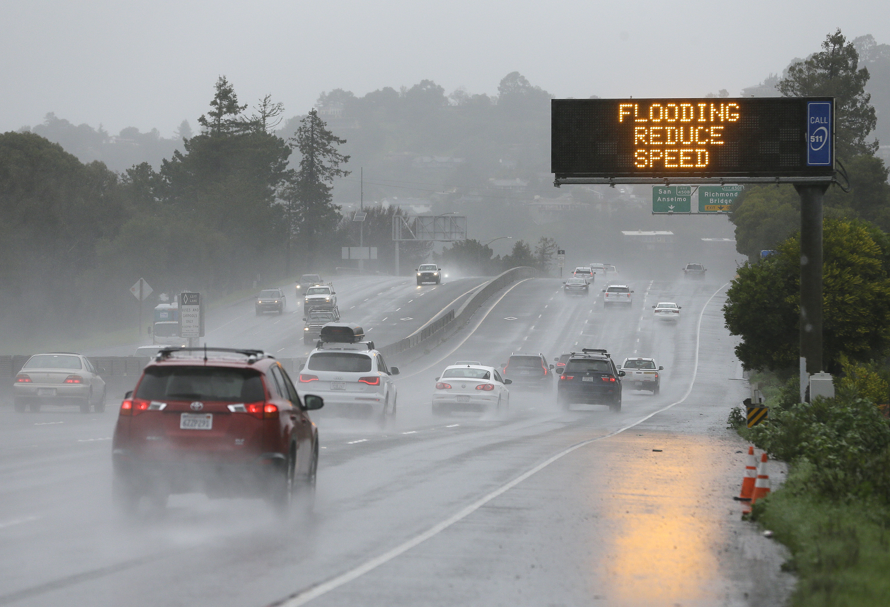 The Latest: 225 people evacuated from flooded neighborhood