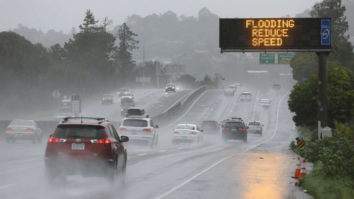 The Latest: 225 people evacuated from flooded neighborhood