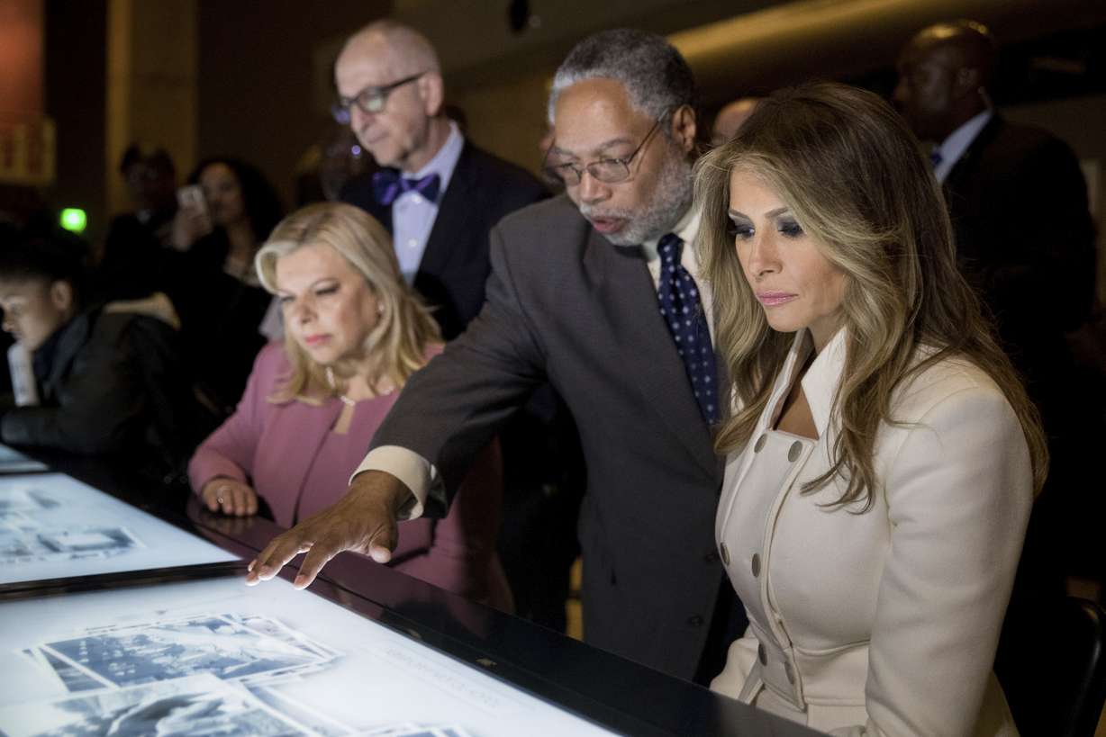 First lady Melania Trump and Sara Netanyahu, wife of Israeli Prime Minister Benjamin Netanyahu tour the Smithsonian's National Museum of African American History and Culture in Washington, Wednesday, Feb. 15, 2017, with Director Lonnie Bunch, second from right, and Smithsonian Secretary David Skorton. (AP Photo/Andrew Harnik)