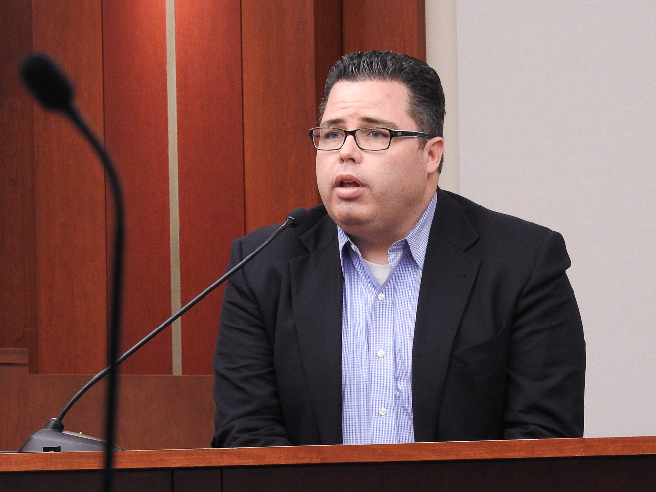 Cort Walker, who worked for Check City, the payday lending company owned by Richard Rawle, testifies during former Utah Attorney General John Swallow's trial at the Matheson Courthouse in Salt Lake City on Tuesda, Feb. 21, 2017. (Photo: Trent Nelson)