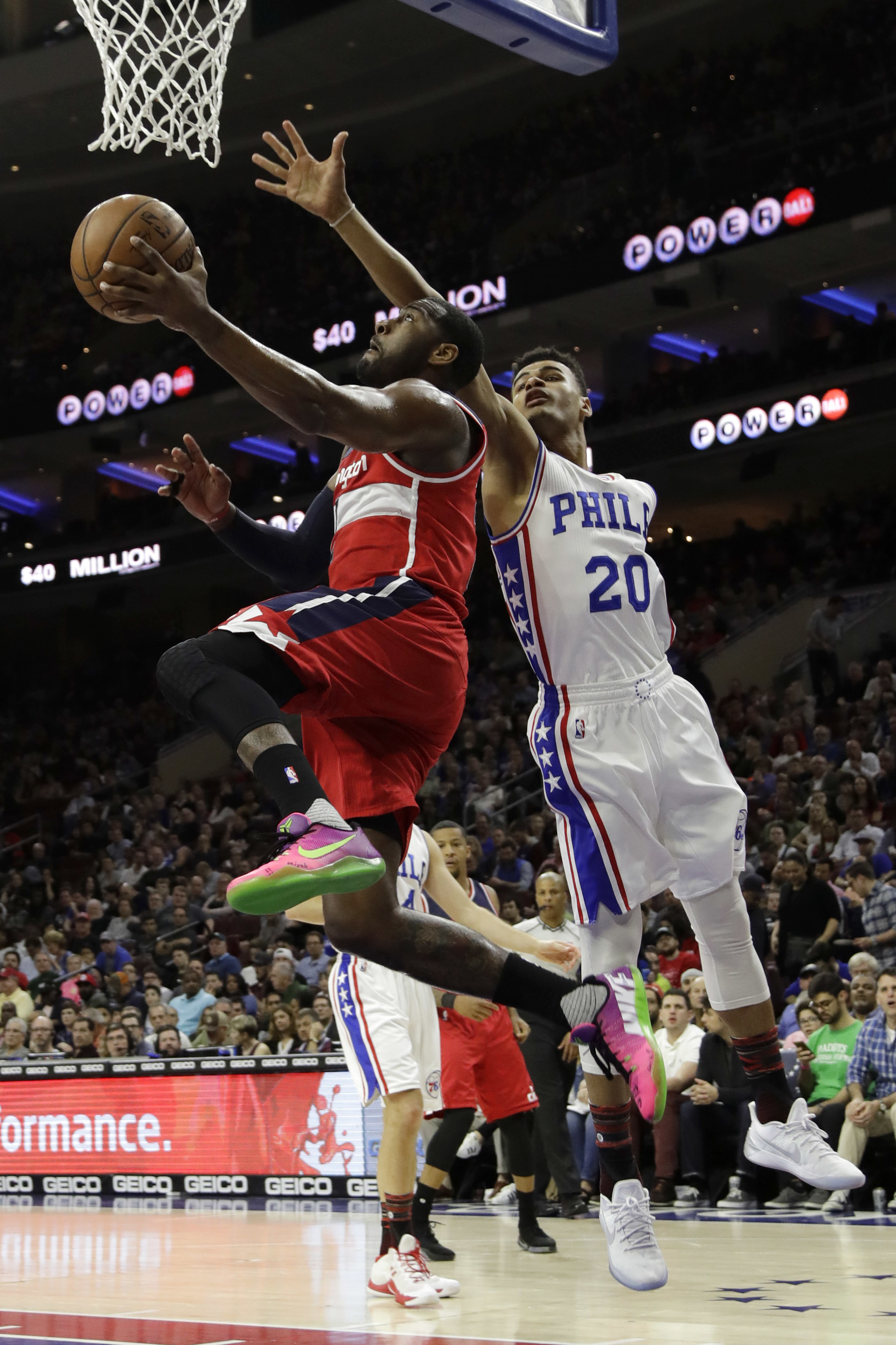 Covington, Saric lead Sixers to 120-112 win over Wizards