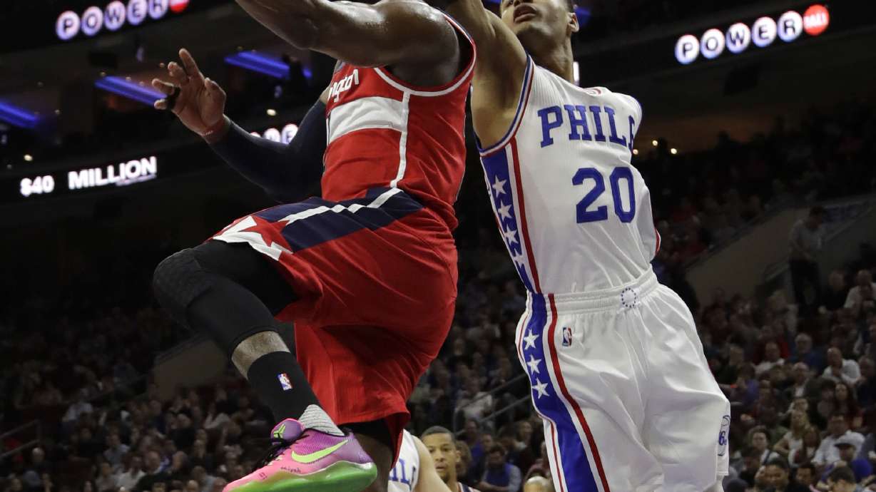Covington, Saric lead Sixers to 120-112 win over Wizards