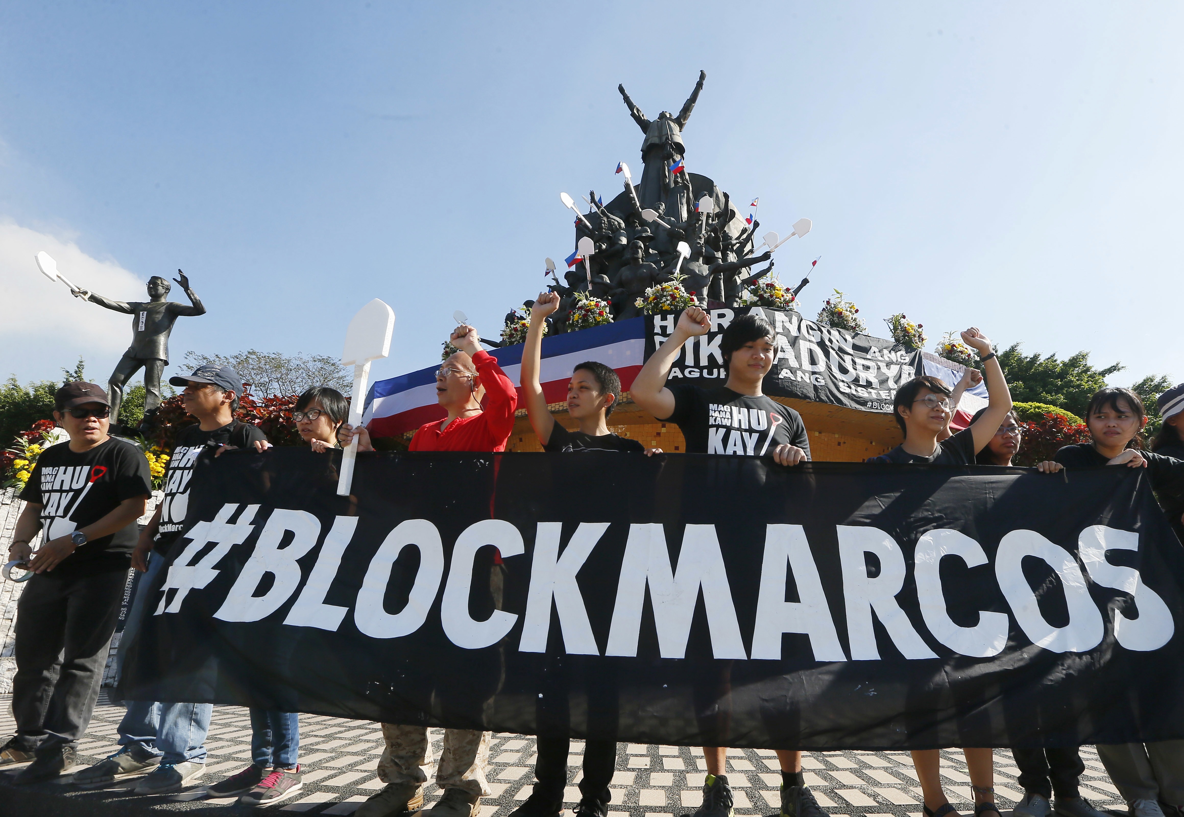 Protesters mark Philippine revolt by condemning killings