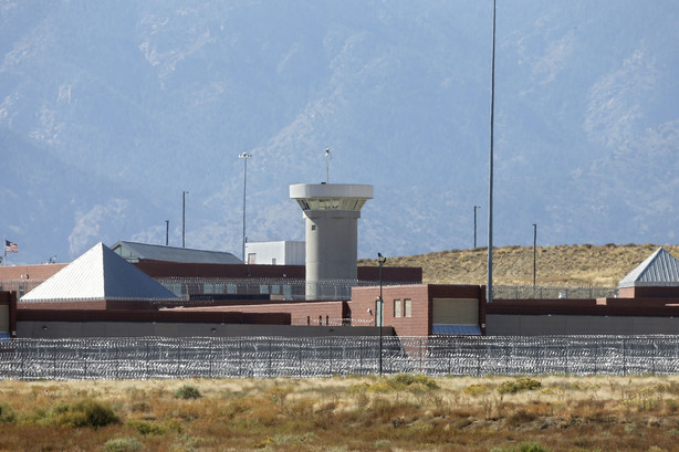 FILE - In this Oct. 15, 2015 file photo, a guard tower looms over a federal prison complex which houses a Supermax facility outside Florence, in southern Colorado. (Photo: Brennan Linsley, Associated Press, File)