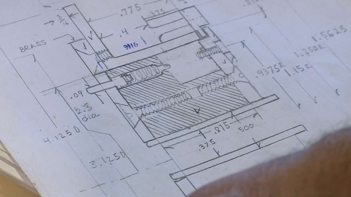Reid Haroldsen couldn't find any plans for his Enigma machine, so he drew his own. (Photo: Ray Boone, KSL TV)