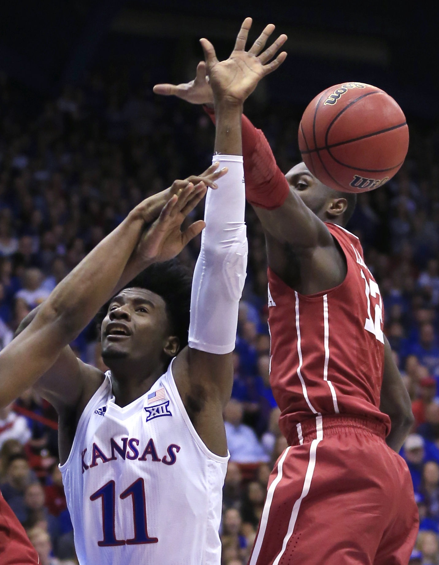 No. 1 Kansas rallies to beat Oklahoma 73-63 on Senior Night