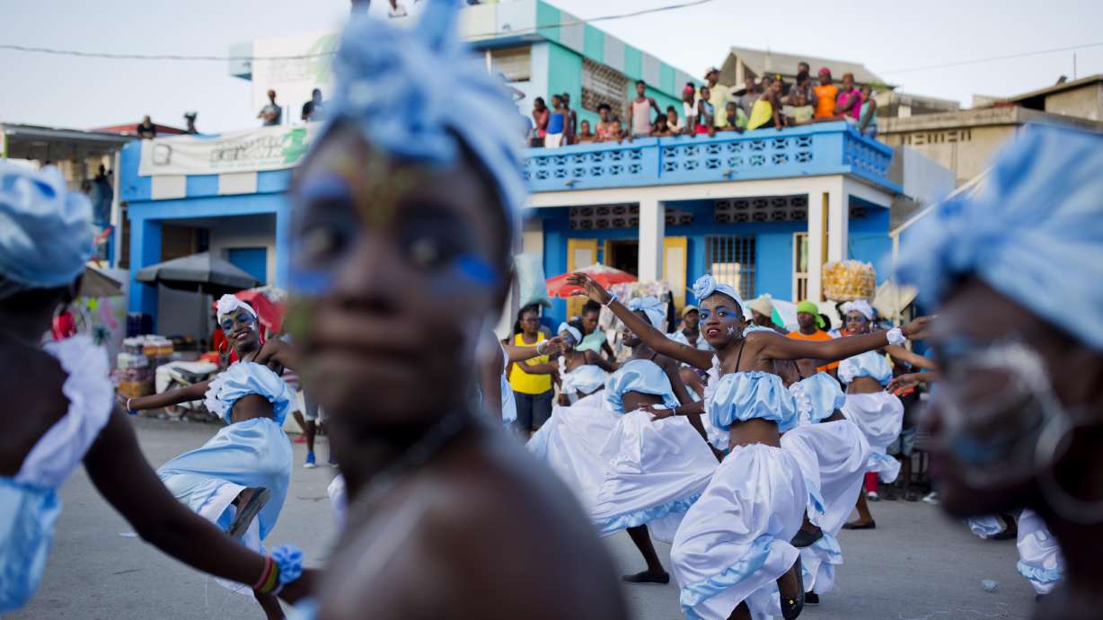 AP PHOTOS: Colorful Carnival in Haiti's storm-hit region