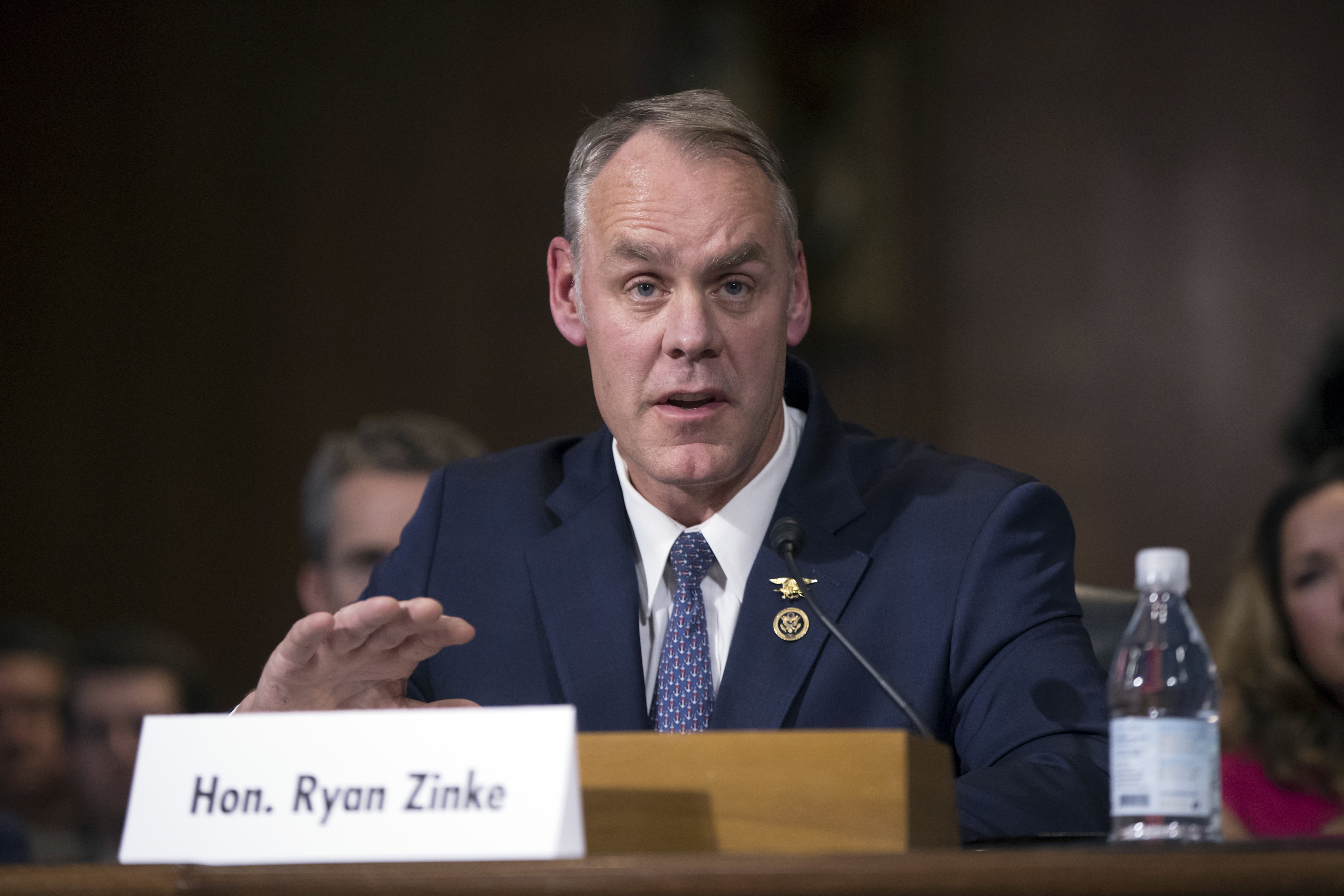 Former Montana Rep. Zinke takes helm of Interior Department