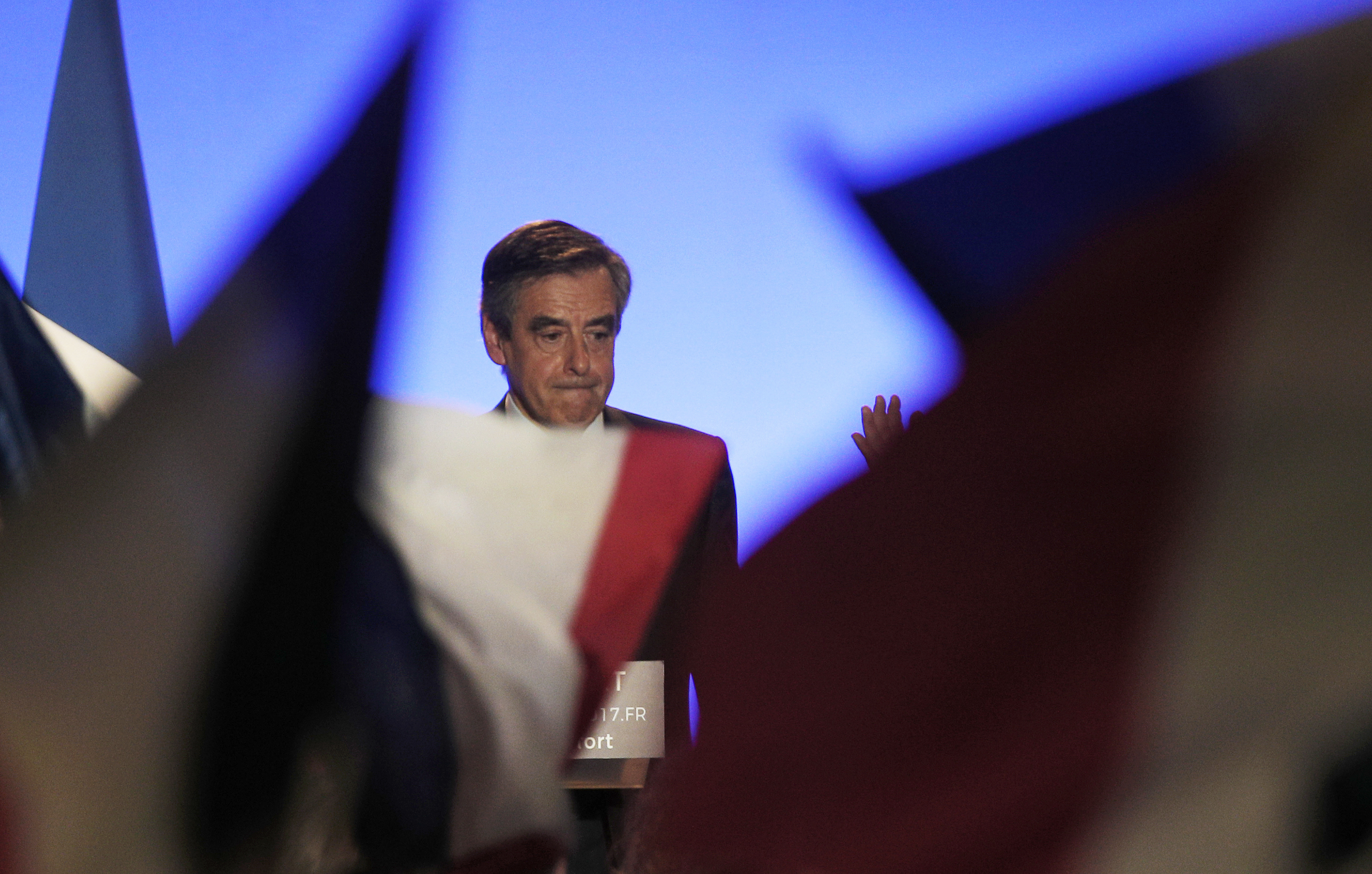 Fillon vows to stay in French race amid defections