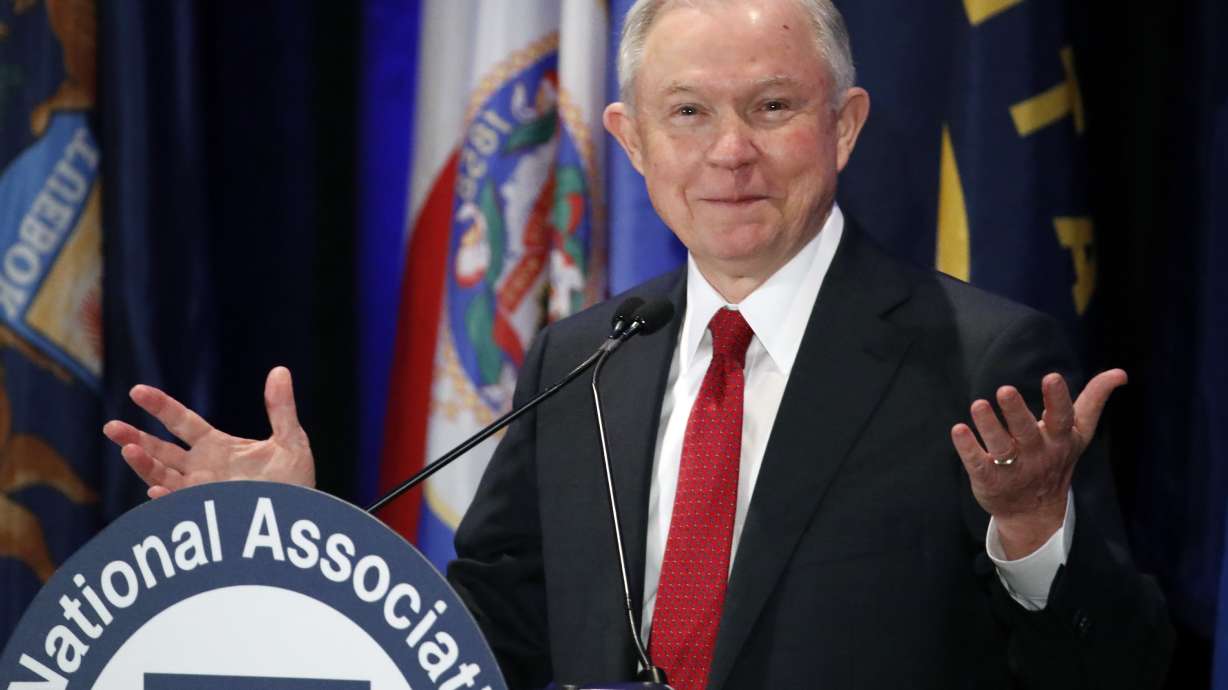 The Latest: Sessions denies meetings to discuss campaign