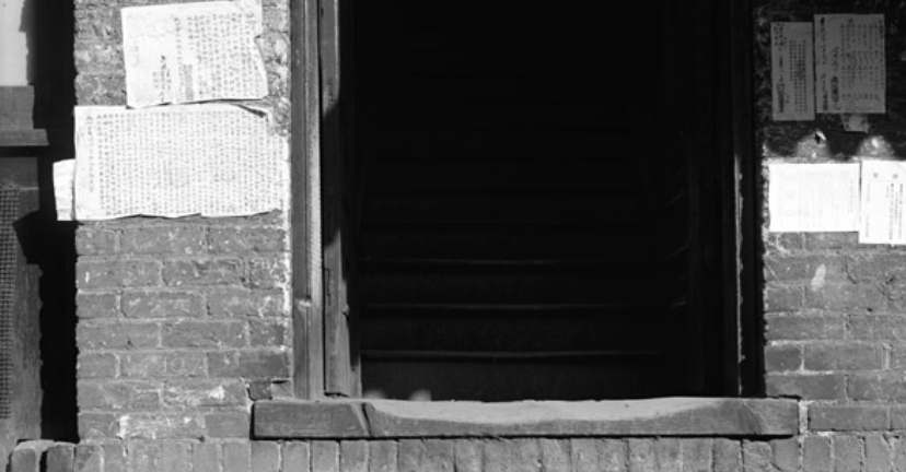 Posters written in Chinese displayed at Plum Alley on October 19, 1911. (Photo: Utah Division of History)