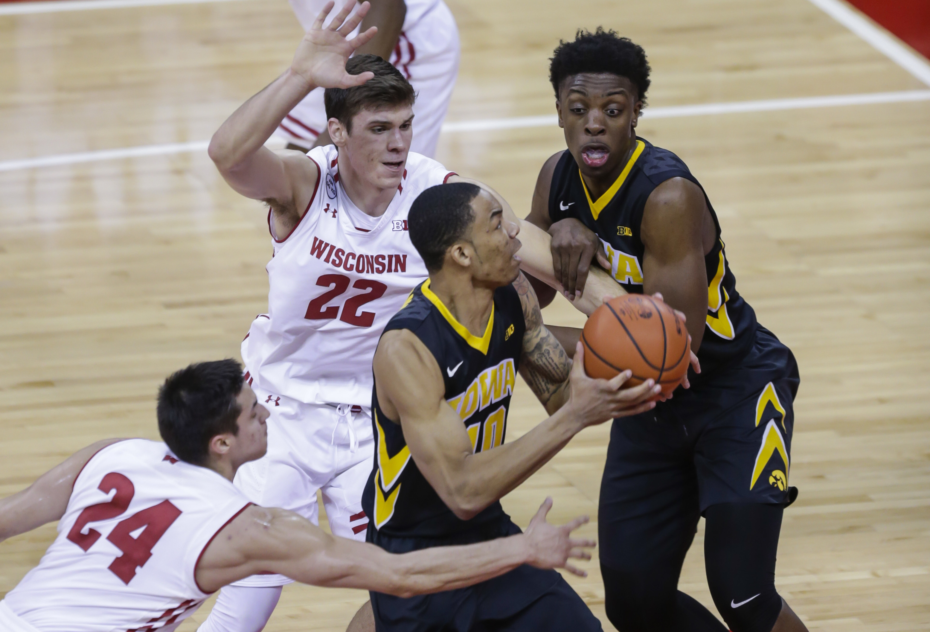 Late 3 gives Iowa win over mistake-prone No. 22 Wisconsin