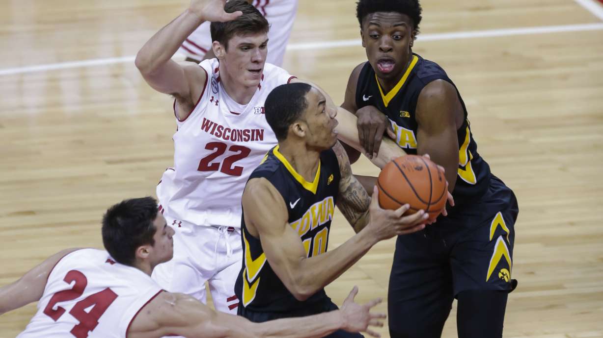Late 3 gives Iowa win over mistake-prone No. 22 Wisconsin