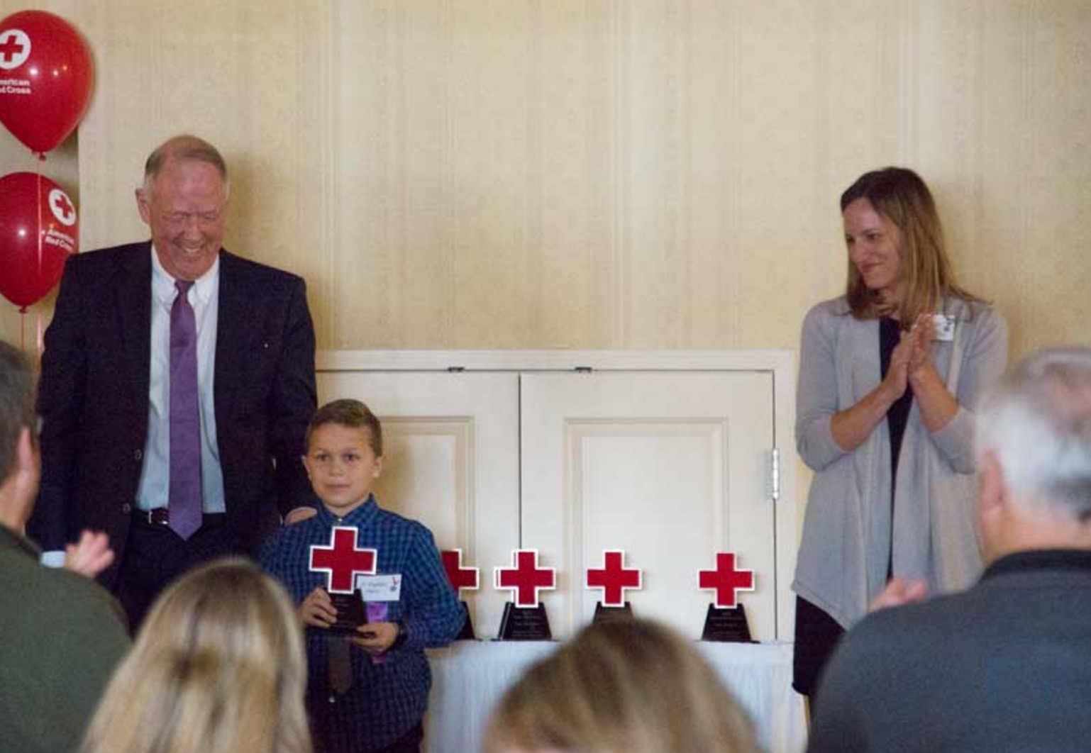 J.T. Parker receives his American Red Cross East Idaho Real Hero award during a ceremony Thursday. (Photo: Stephan Rockefeller, EastIdahoNews.com)