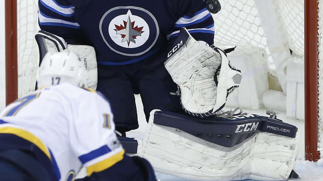 Hellebuyck stops 29 shots, Jets beat Blues 3-0