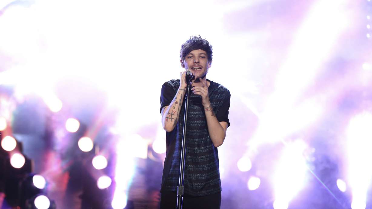 One Direction's Louis Tomlinson arrested in airport scuffle