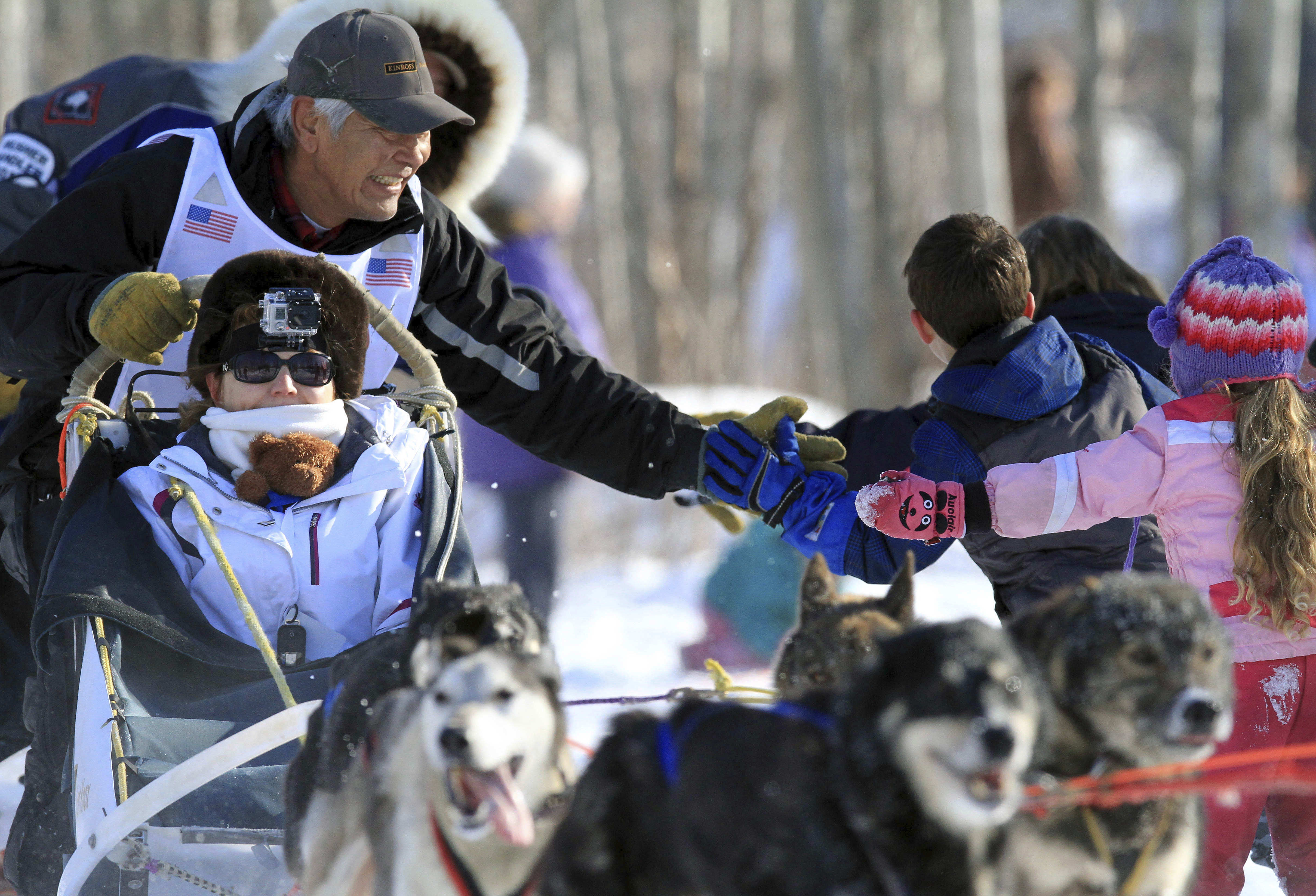 The Latest: Iditarod draws fans from around the world