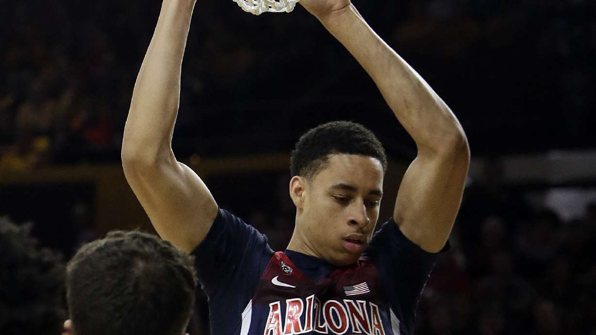 No. 7 Arizona pulls away to beat Arizona State 73-60