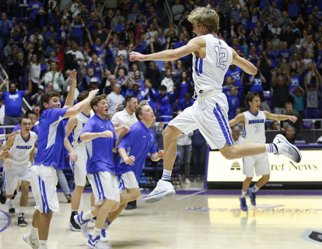 Bingham's Preston Fowlkes (12) and teammates celebrate their win over Lone Peak in the 5A state championship at Weber State in Ogden on Saturday, March 4, 2017. Bingham won 49-42. (Photo: Jeffrey D. Allred, Deseret News)