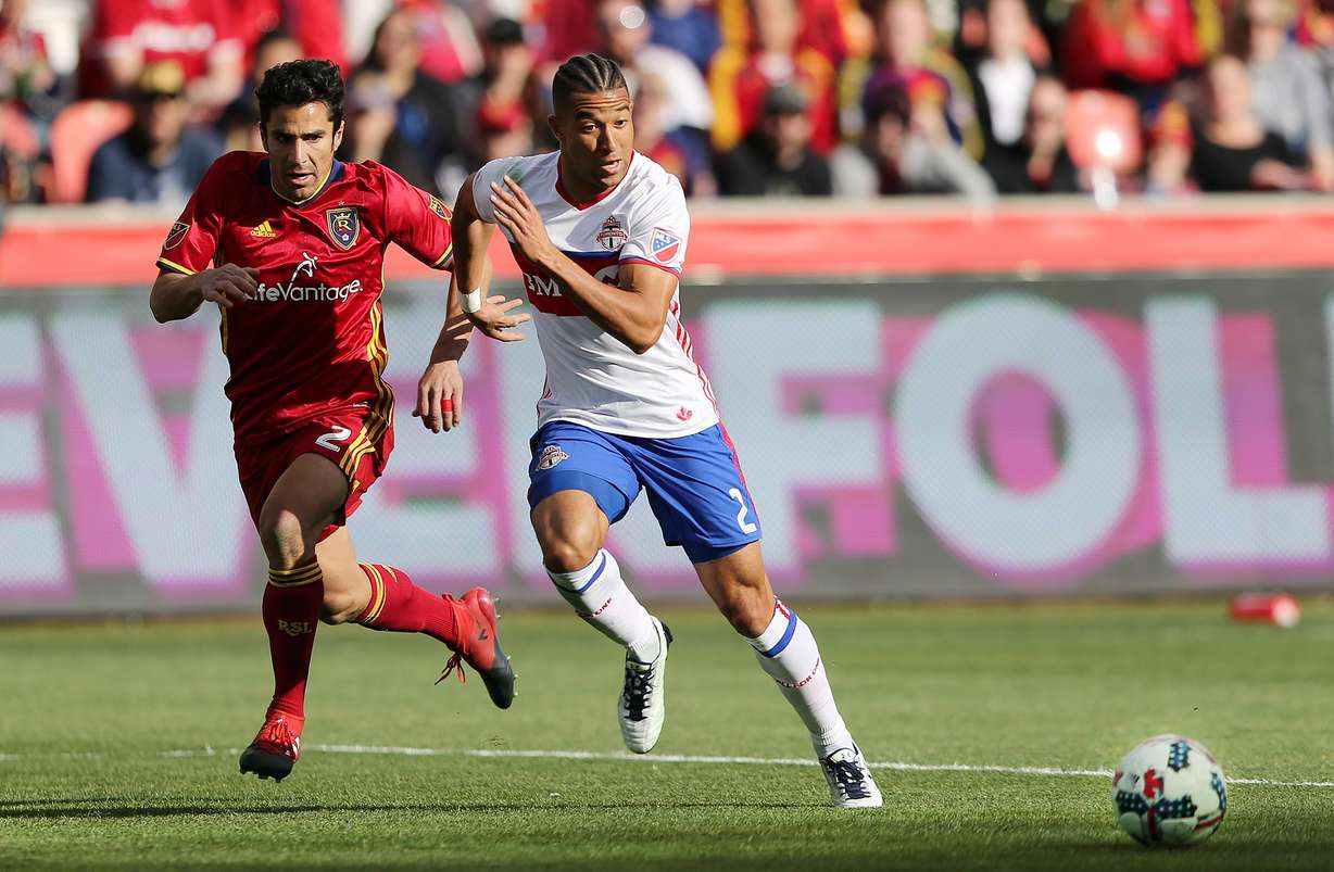Real Salt Lake defender Tony Beltran (2) and Toronto FC defender Justin Morrow (2) chase down the ball as Real Salt Lake and Toronto FC play at Rio Tinto Stadium in Sandy Utah on Saturday, March 4, 2017. (Photo: Scott G Winterton, Deseret News)