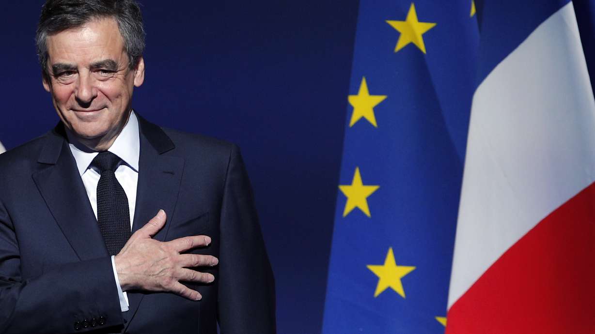 Fillon clings to French presidential race; party not sure