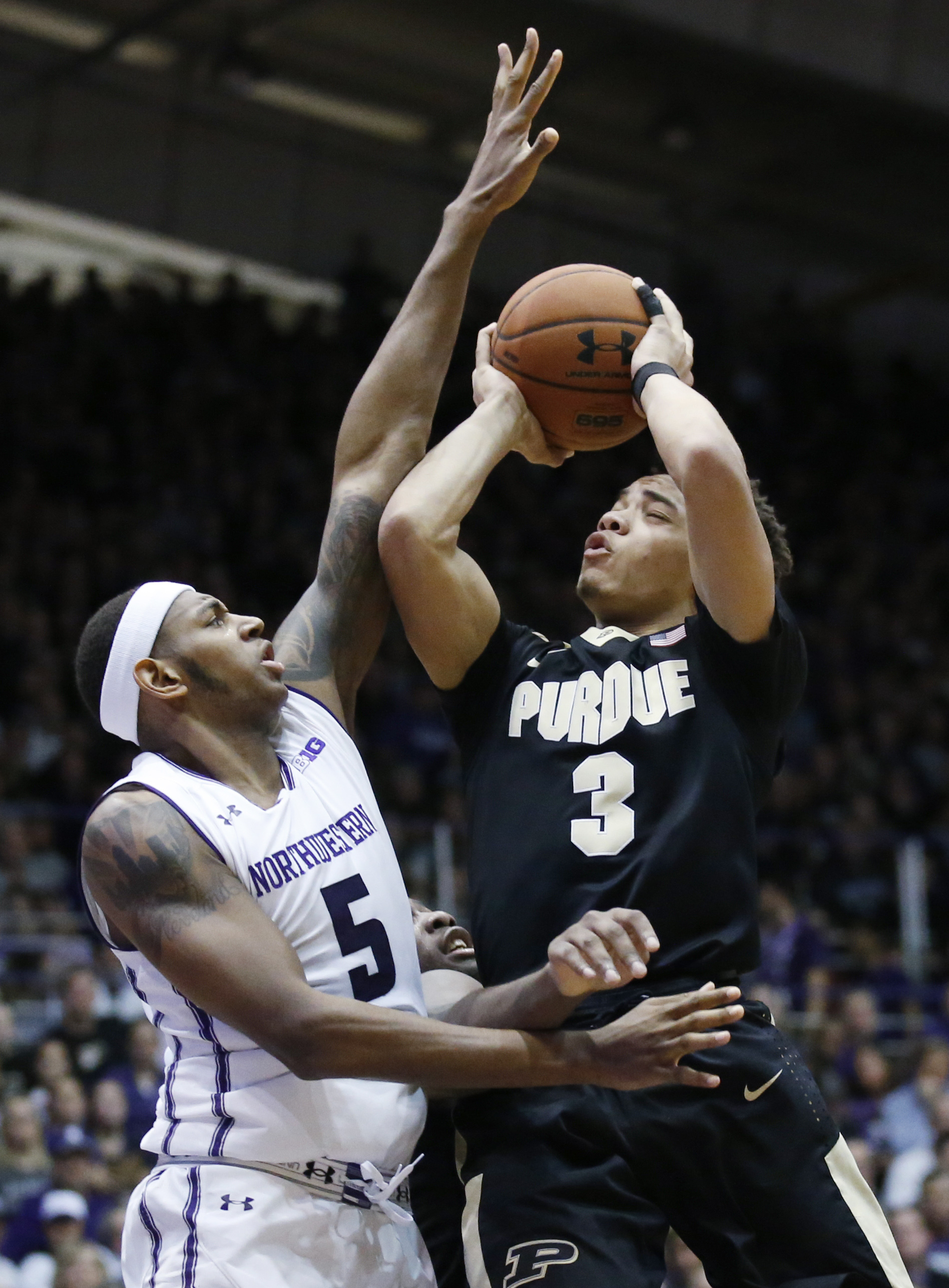 Edwards leads No. 16 Purdue past Northwestern, 69-65
