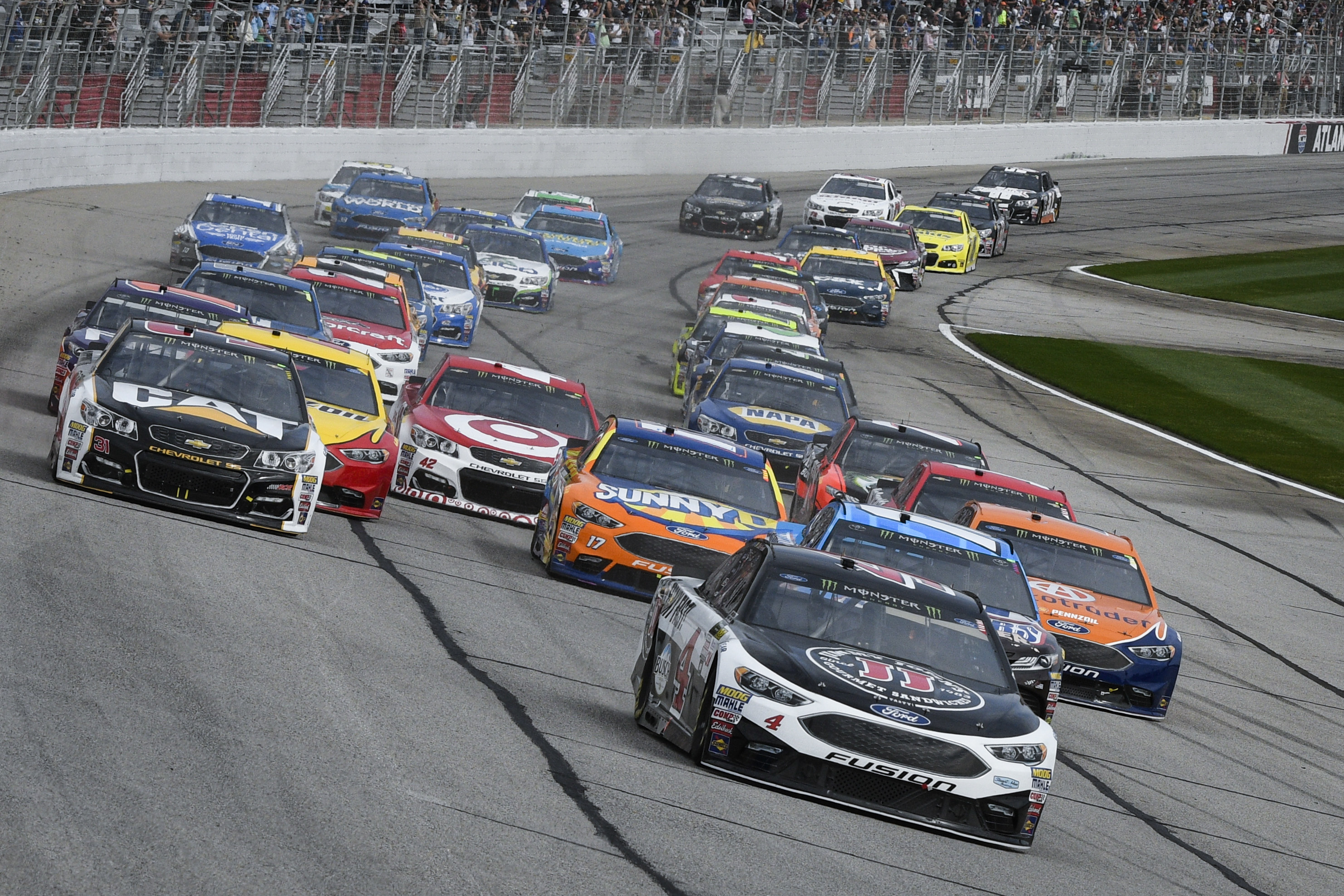 Keselowski steals Atlanta win after Harvick caught speeding