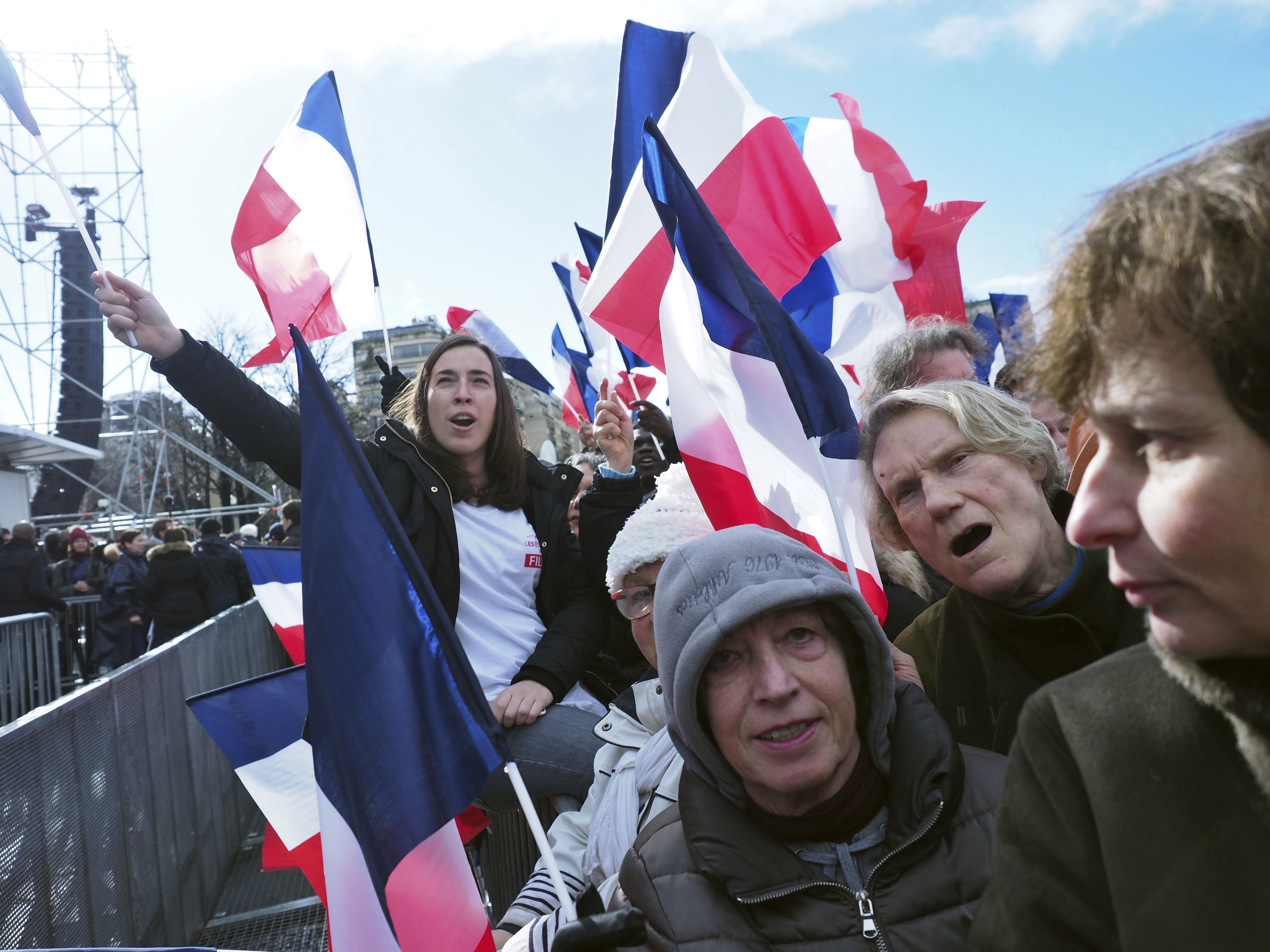 The Latest: Fillon gets unanimous support from his party
