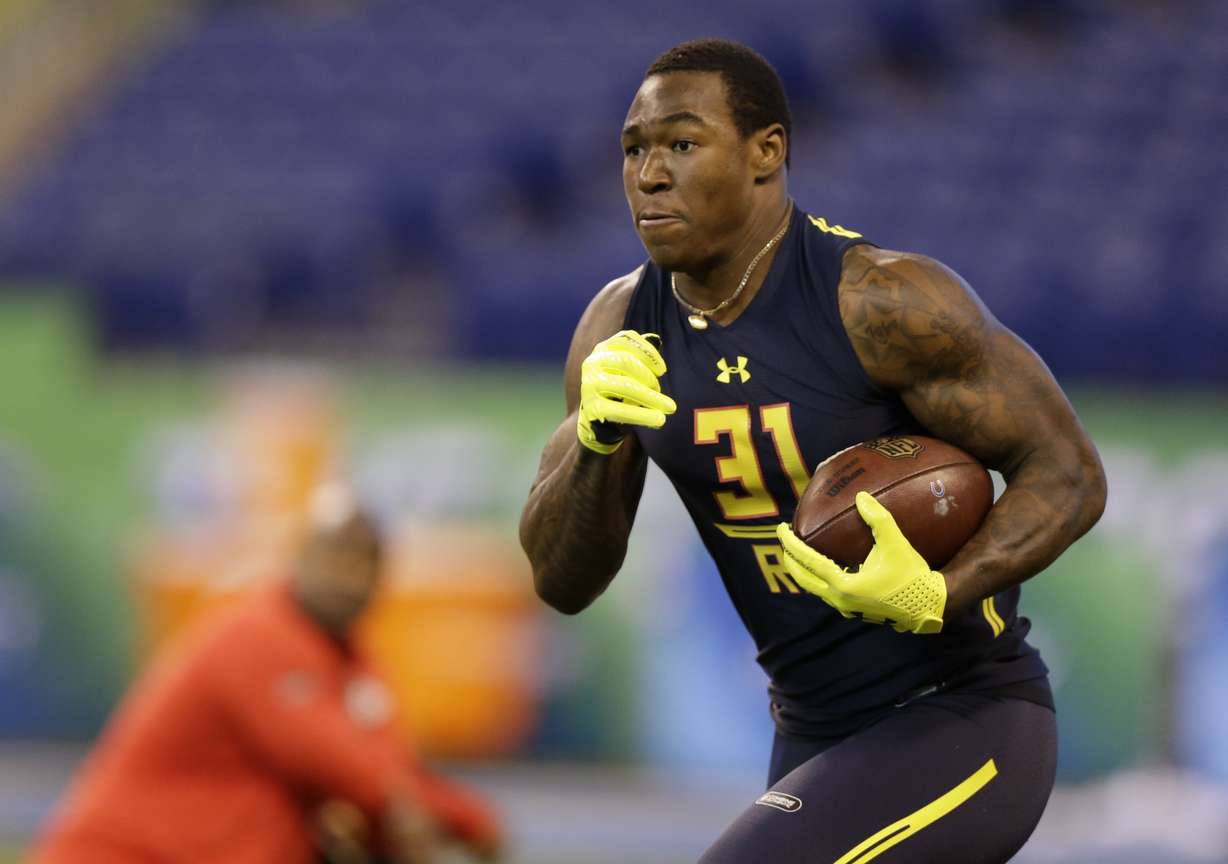 BYU running back Jamaal Williams runs the 40-yard dash at the NFL football scouting combine Friday, March 3, 2017, in Indianapolis. (AP Photo/David J. Phillip)