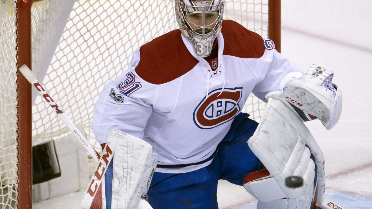 Canadiens edge Canucks in OT for 6th straight win