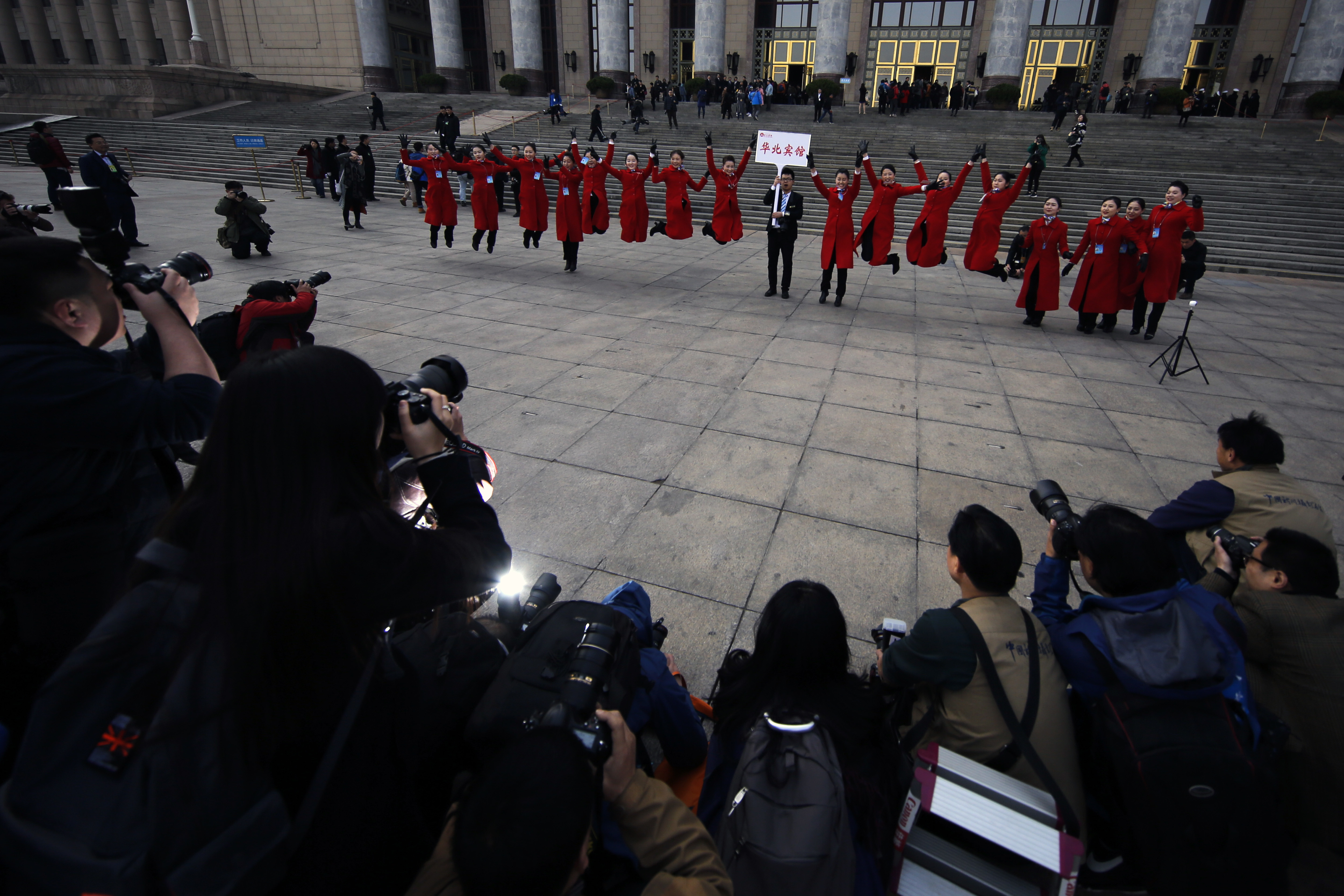 Eyes on selfie-taking ushers at China's political meetings