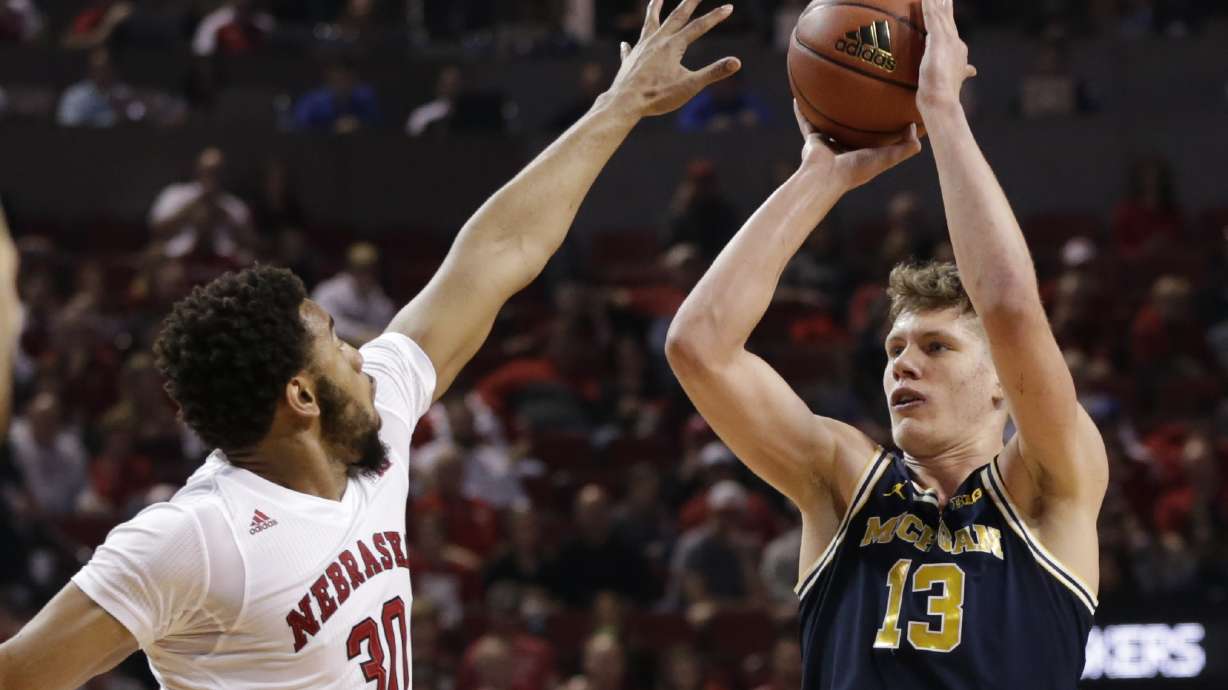 Michigan team plane slides off runway, players safe