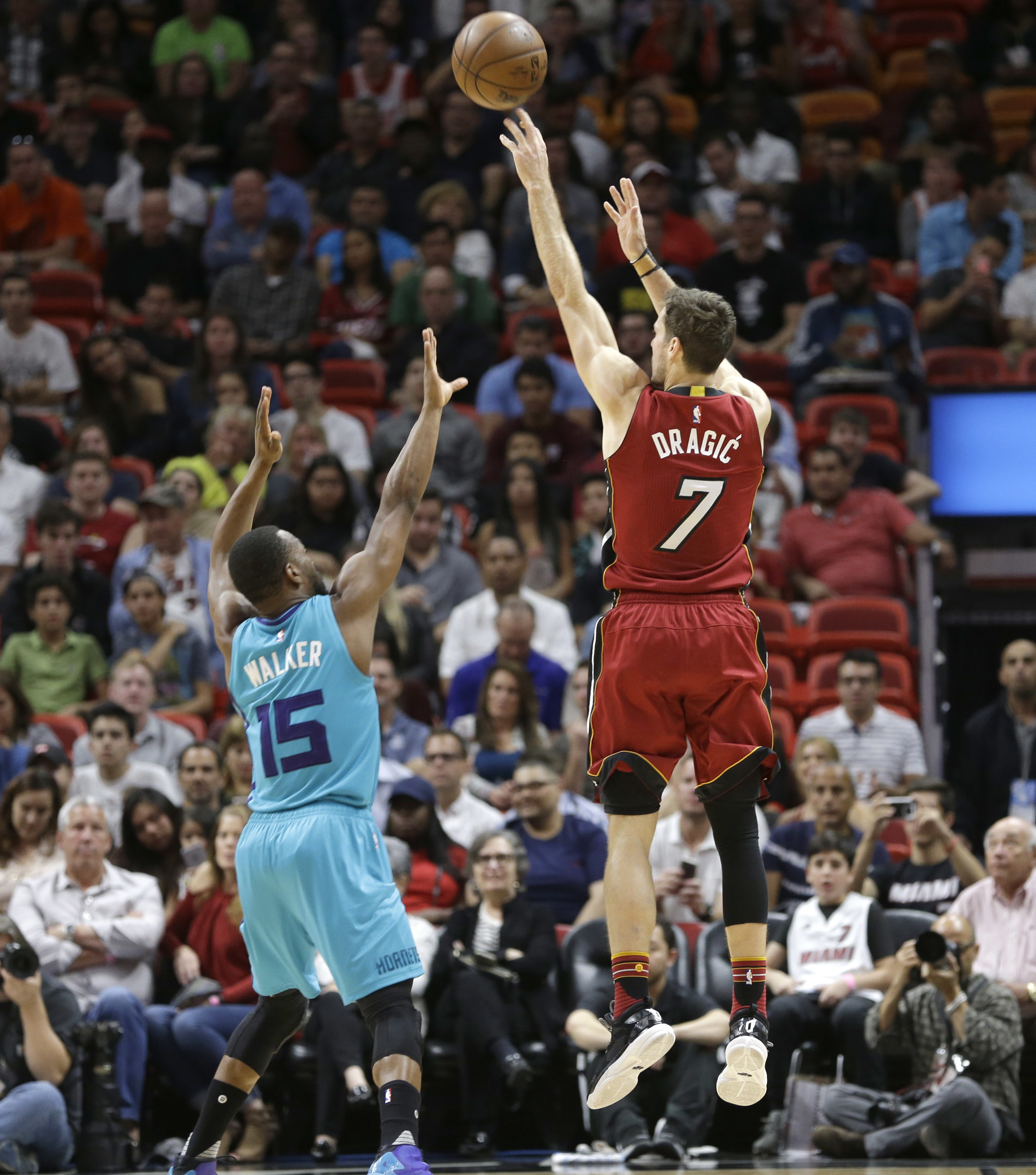 Heat win again, rallying to beat Hornets 108-101