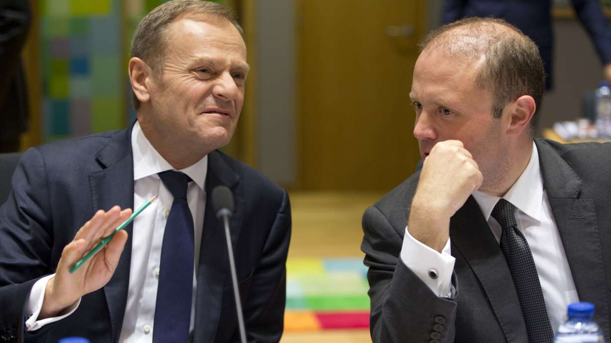 The Latest: May says she is no Thatcher despite EU stance