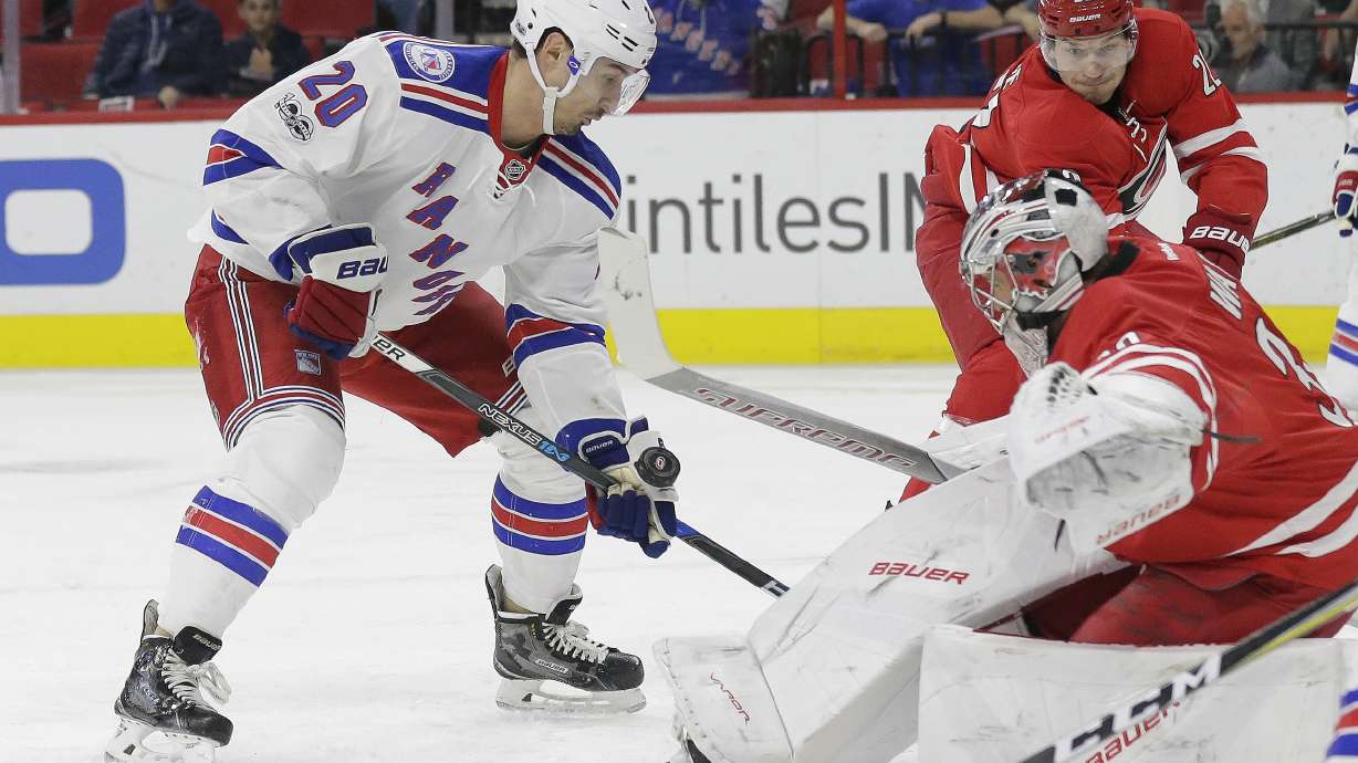 Aho scores 2 late goals, Carolina rallies past Rangers, 4-3
