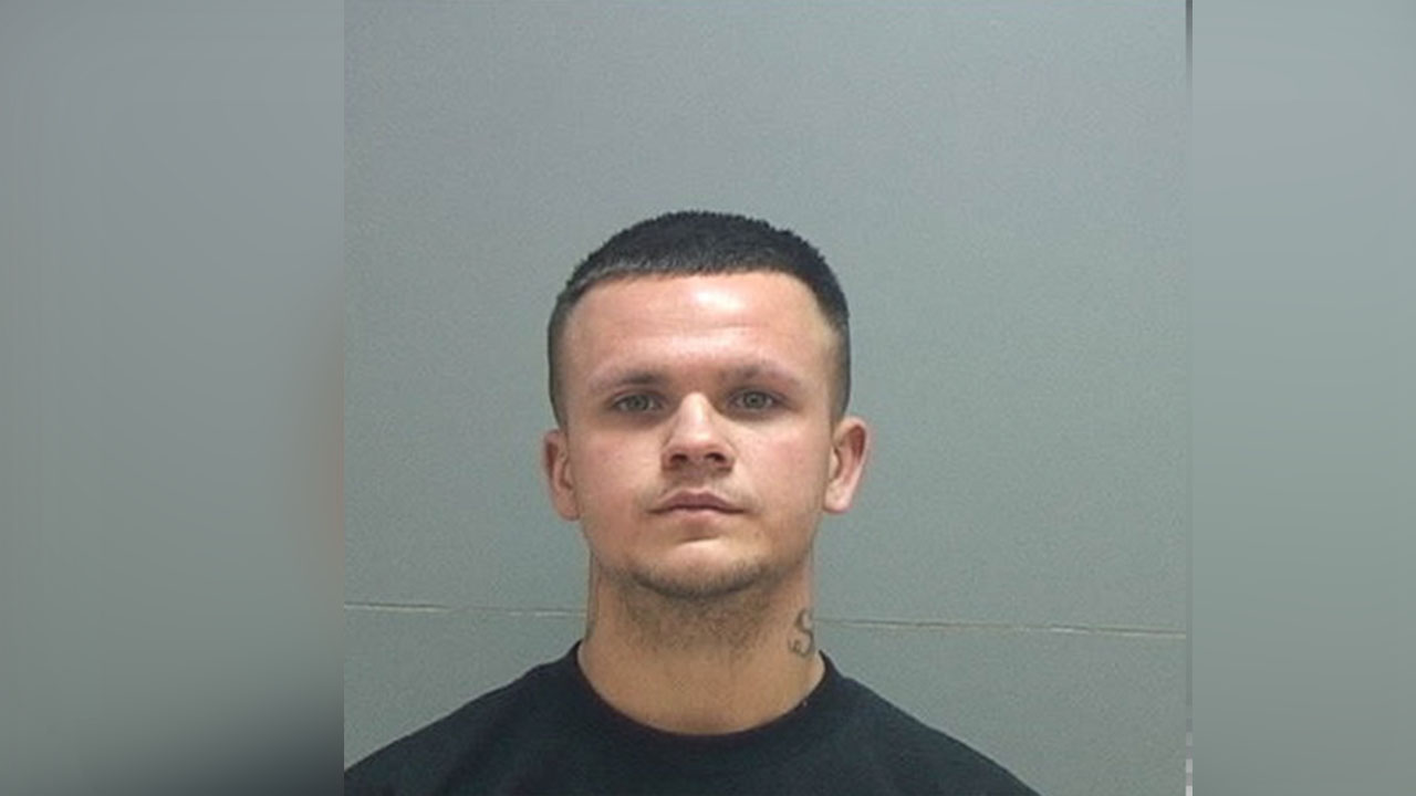 Man charged with assaulting officers while fleeing Unified police