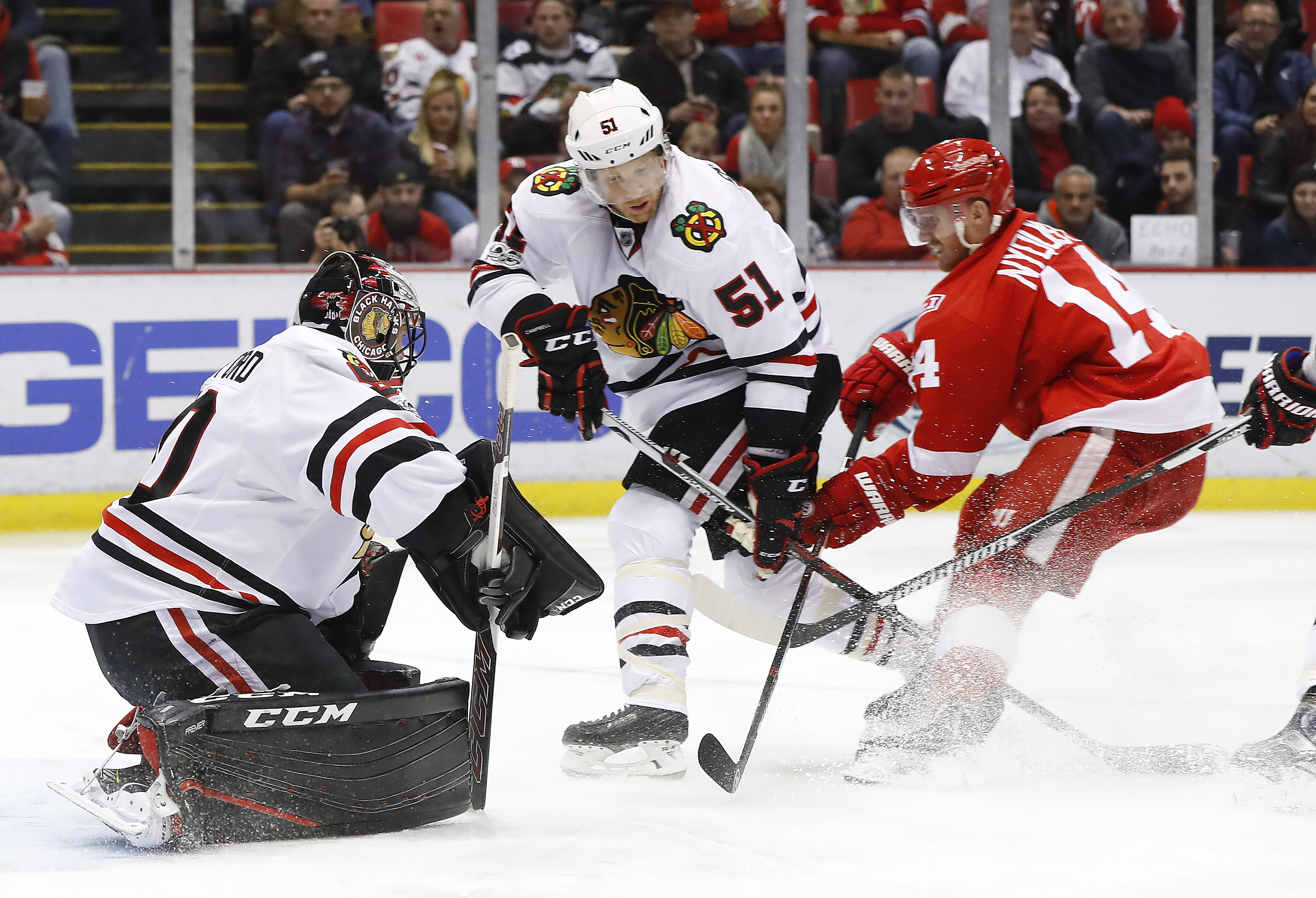 Tatar, Howard lead Red Wings past Blackhawks, 4-2.