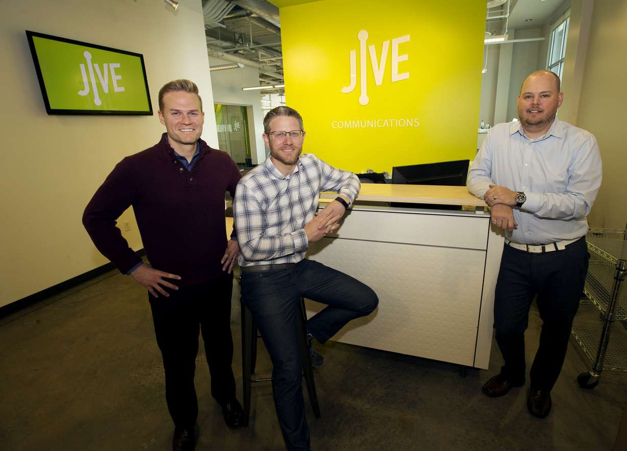 Jive Communications co-founders John Pope, left, Mike Sharp, and Matthew Peterson, pose for a photo in the lobby of the company's headquarters in Lindon on Friday, March 10, 2017. Photo: Scott G Winterton, Deseret News